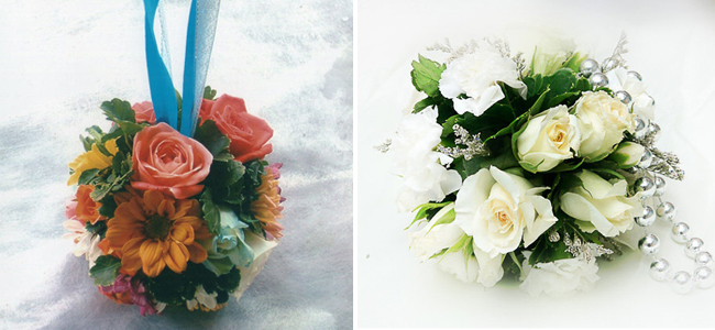 Left: A vibrant pomander bouquet, strung by a thick blue ribbon by Julius and Carol Flower Shop and Right: White-shade pomander bouquet connected by a beaded handle by Gemmas Flower Shop