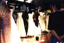 A row of gorgeous white gowns.