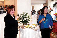 (L-R) Ms. Marie Jean dela Cruz, sales director of Bayview  Park Hotel Manila, and Ms. Herminia B. Estialbo, co-producer and events and marketing director of Blessed Concepts Production