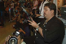 Photographers in motion during the fashion show