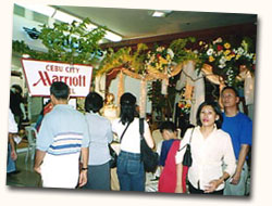 Event attendees admire the setup of Cebu City Marriott Hotel