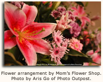 Flower arrangement by Mom's Flower Shop