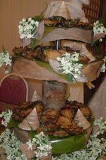 -	three-tiered bibingkang kabog cake of Boom Roxas