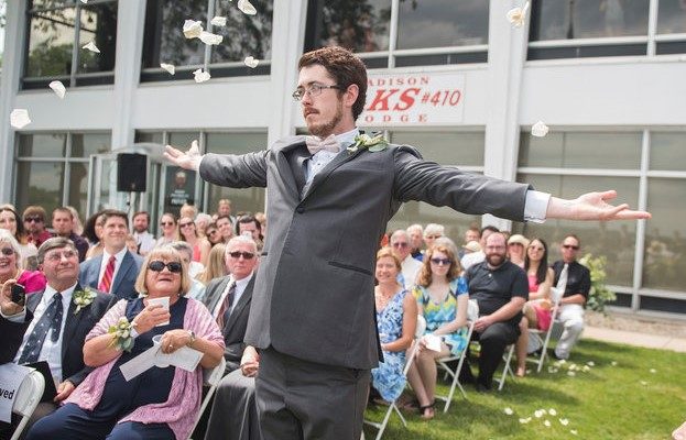 Grown Man Serves as ‘Flower Girl’ at Cousin’s Wedding grown man flower girl
