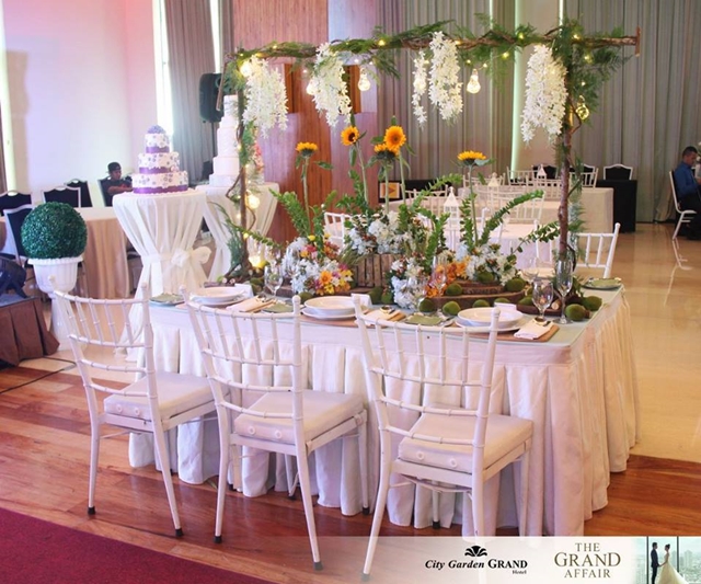 city garden grand hotel the grand affair sunflower themed table setup