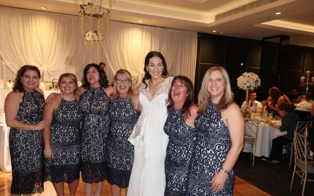 six women wore the same dress to a wedding