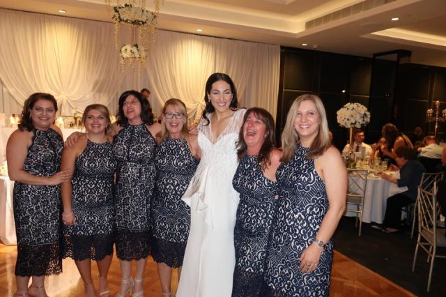 six women wore the same dress to a wedding