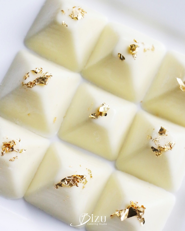 white chocolate truffle with edible gold leaf bizu catering studio