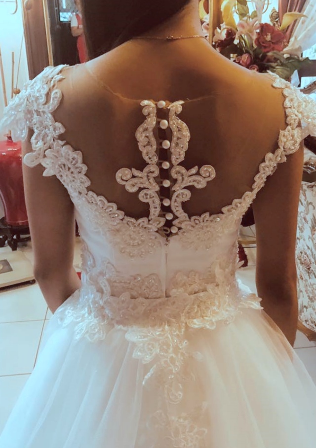 Wedding dress by New Creation Fashion By Evelyn G. Guerrero