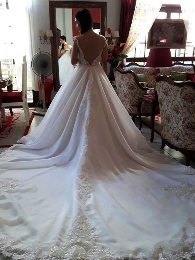 Wedding dress by New Creation Fashion By Evelyn G. Guerrero